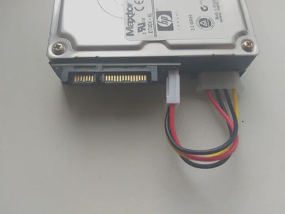 IDE drive with IDE to SATA converter installed, top
